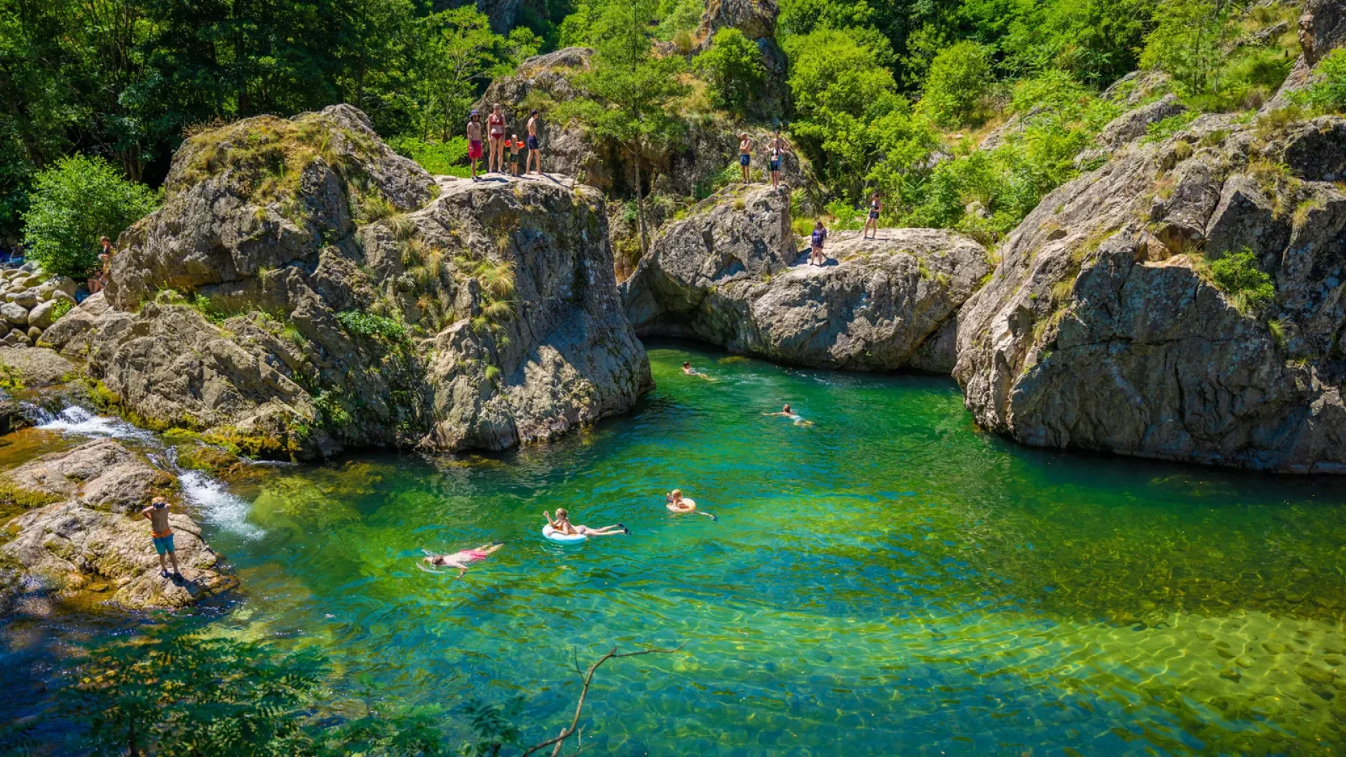 Swimming near the village with outstanding character of Jaujac, in summer
