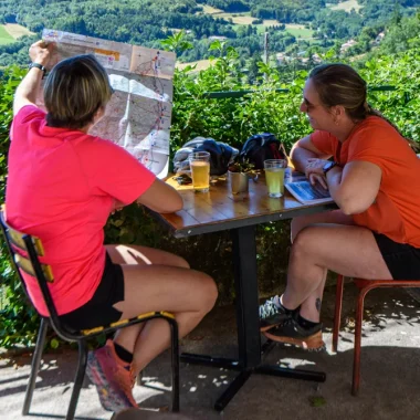 Women looking at an Ardeche map