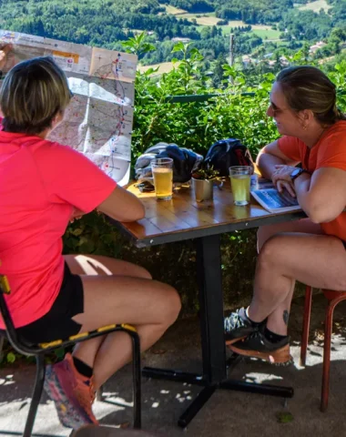 Women looking at an Ardeche map