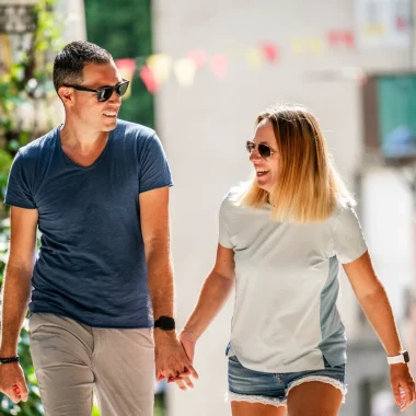 Couple wandering in the village with outstanding character of Beauchastel