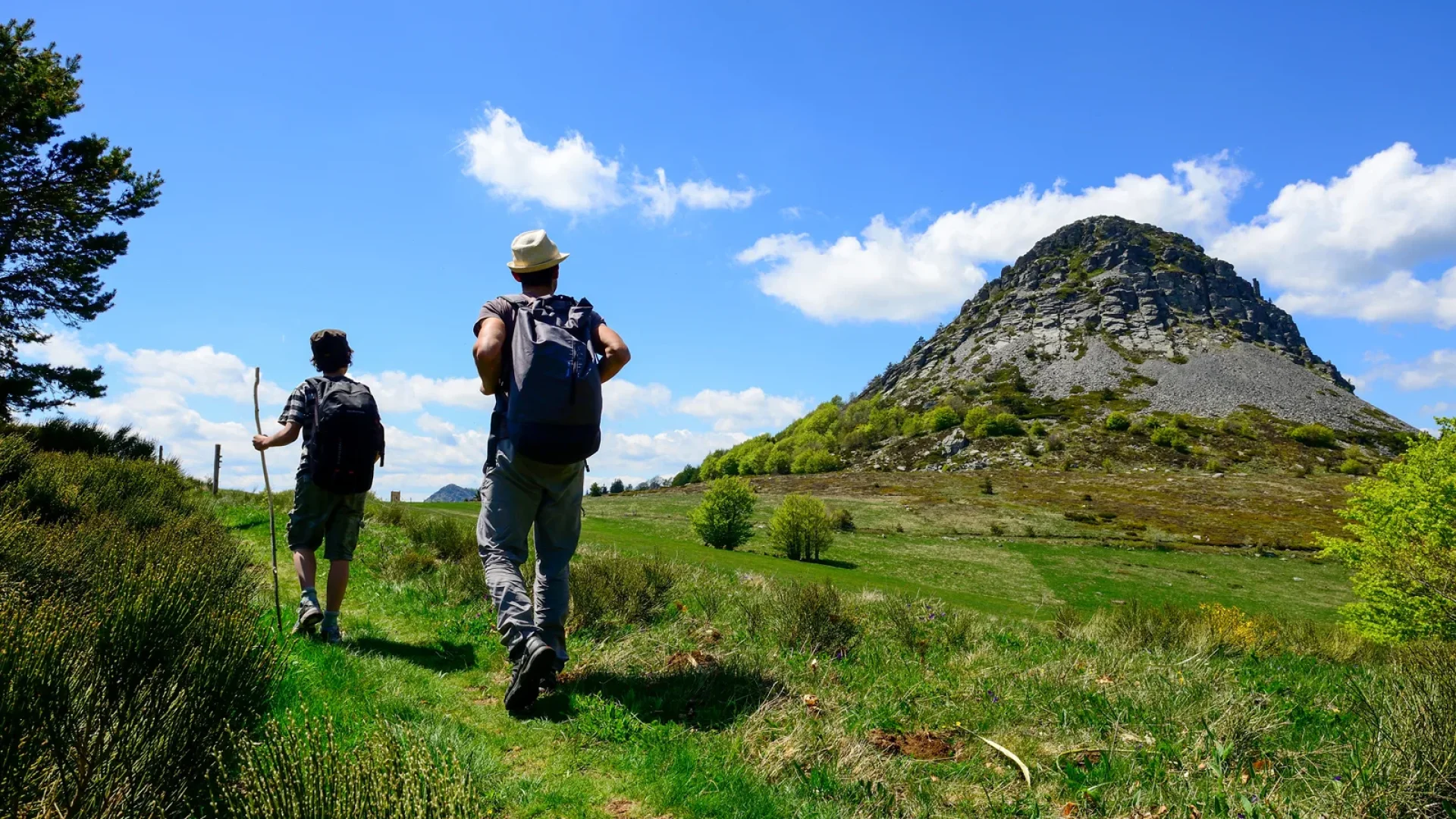Family hiking at the Mont Gerbier de Jonc, in spring