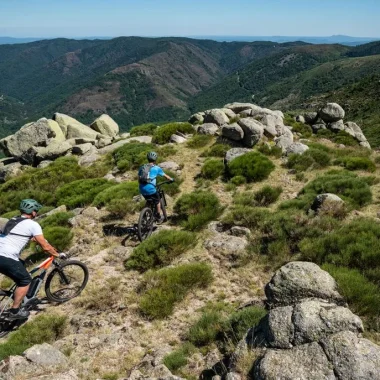 The Ardeche Great Mountain bike route - Two men reaching a point of view in Sablières, in summer