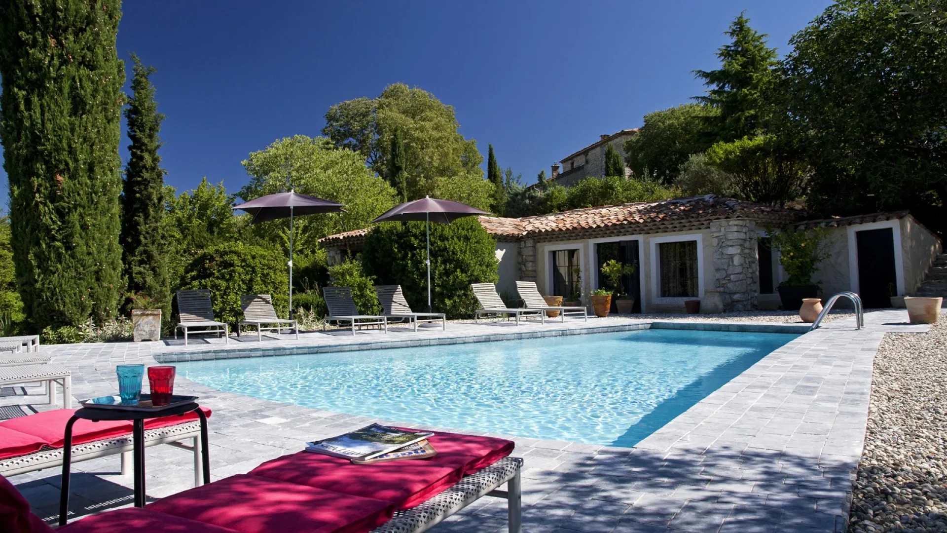 Outdoor area with swimming pool of the “La Santoline” hotel in Beaulieu