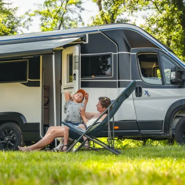 Family on a campervan area