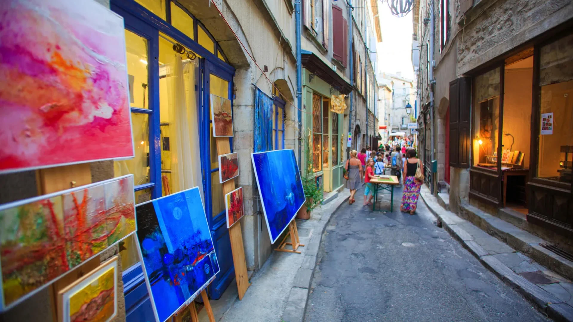Family at the Joyeuse creators' night market in summer