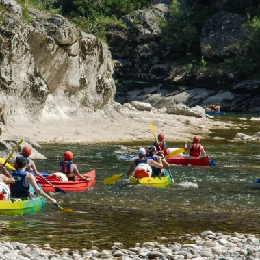 Group canoeing in the Ardèche Gorges in summer
